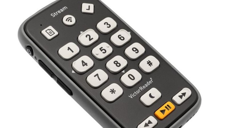En svart daisyspelare i form av en mobiltelefon, svart med vita knappar.